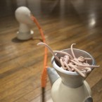 ceramic sculpture, contemporary ceramics, parasites, hot dog, meat grinder, pig butt